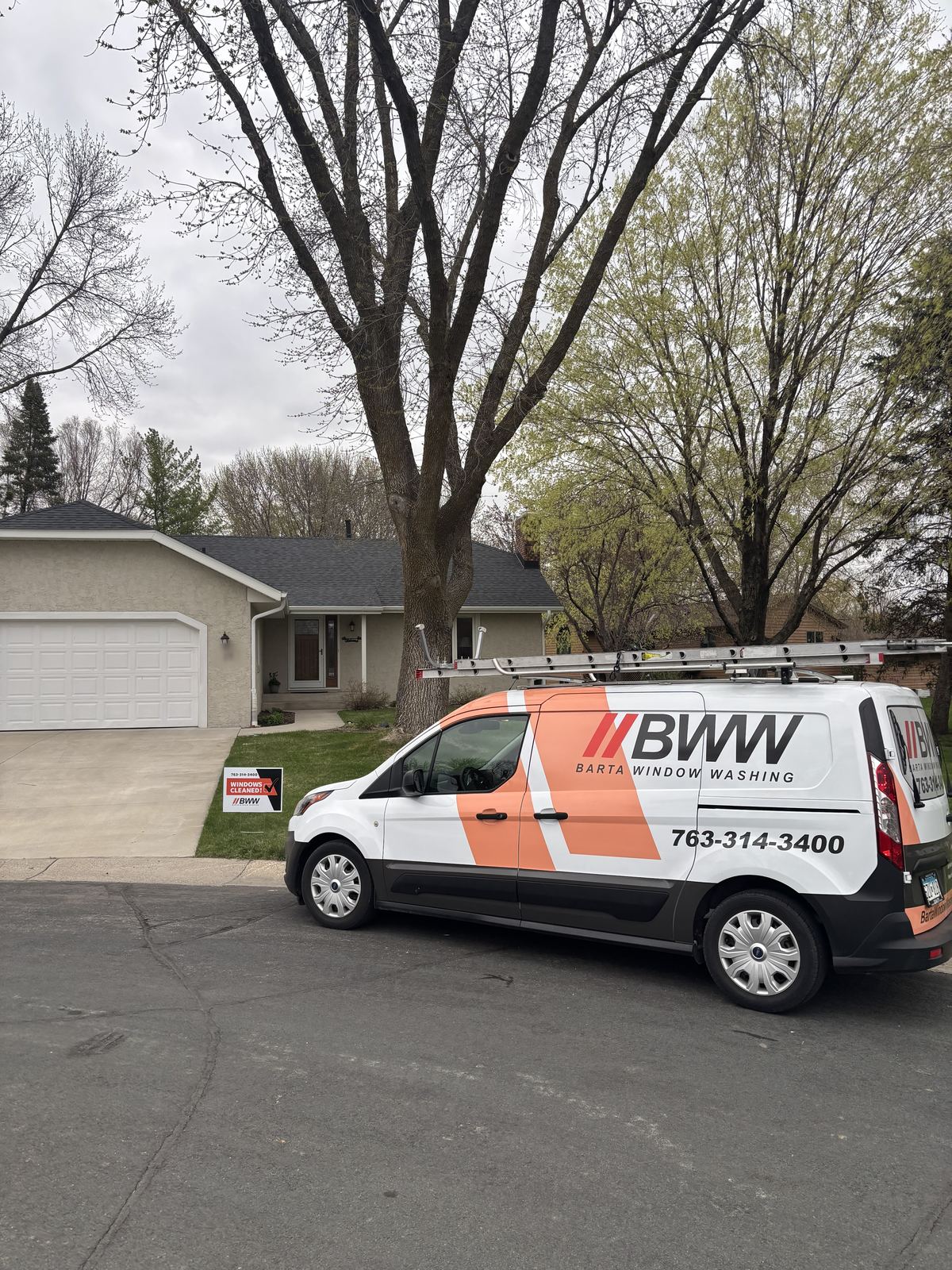 Barta Window Washing van parked outside a Waconia home for a spring window cleaning
